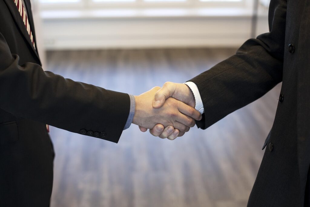 leaders shaking hands
