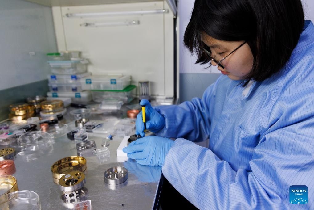 A researcher deals with the lunar sample to be tested at the NanoSIMS Lab of the Institute of Geology and Geophysics of the Chinese Academy of Sciences in Beijing, China, April 8, 2025. (Xinhua/Jin Liwang)