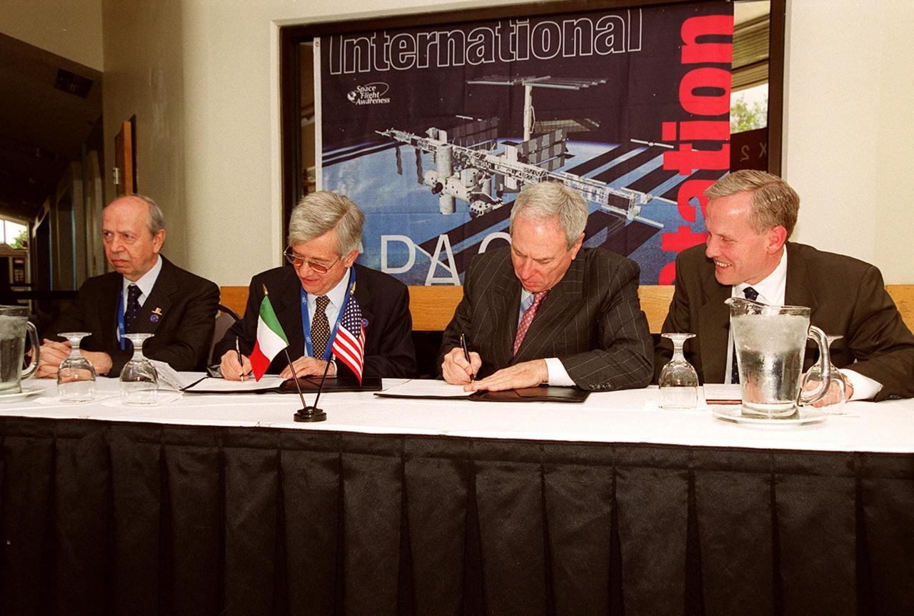 NASA Administrator Daniel S. Goldin and Italian Space Agency (ASI) President Sergio DeJulio sign a Framework for Cooperation to build the Habitation Module for the International Space Station