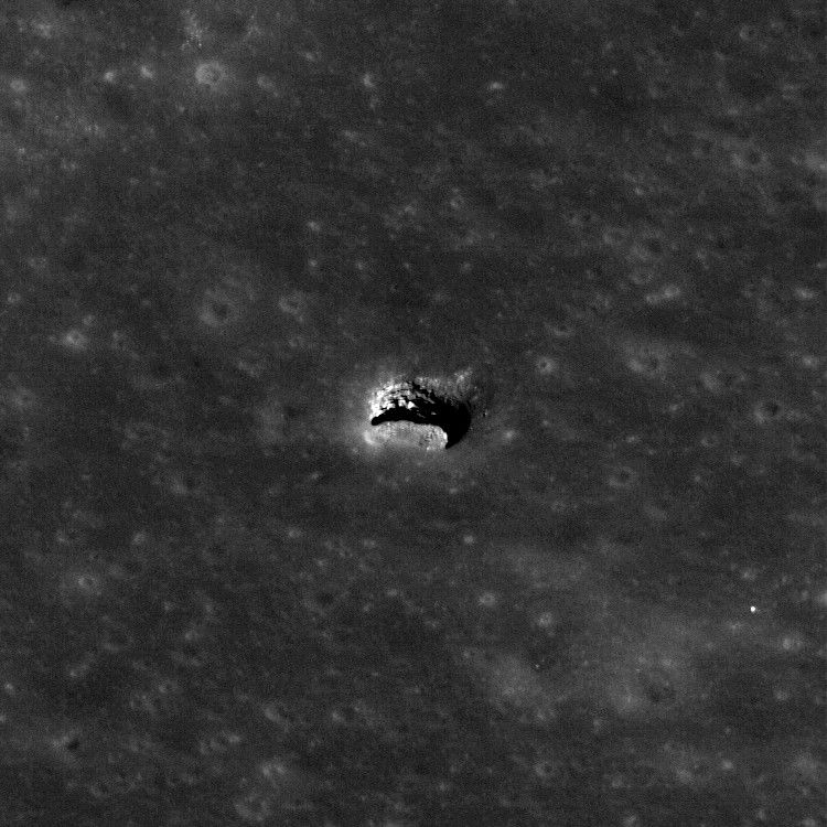 A high-Sun view of the Mare Tranquillitatis pit crater reveals boulders on an otherwise smooth floor. This image from LRO’s Narrow Angle Camera is 400 meters (1,312 feet) wide, north is up.