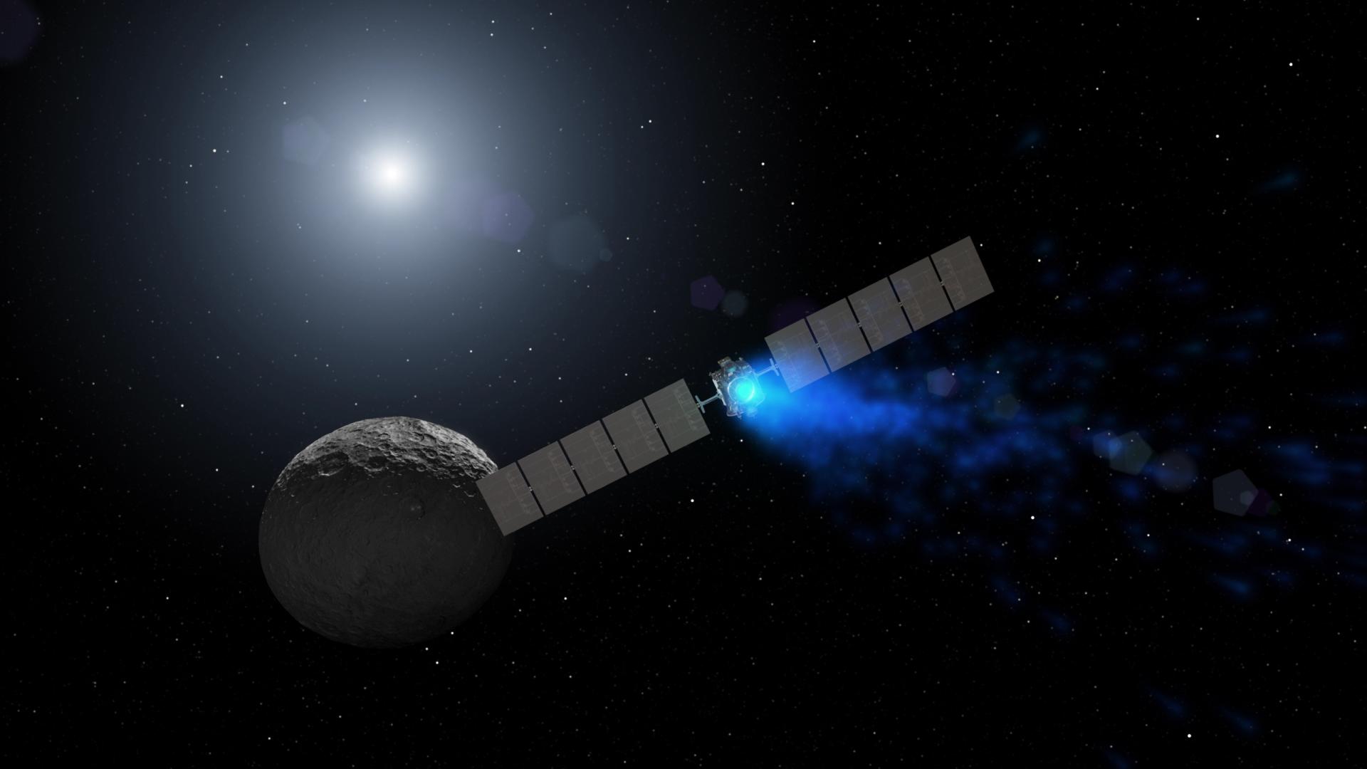 A glowing spacecraft with solar panels passes a cratered asteroid, sunlit against a starry backdrop.