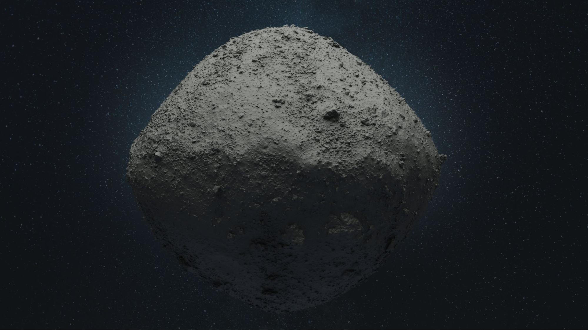  A rocky asteroid with a rough surface floats in space, framed by a dark, star-filled background.