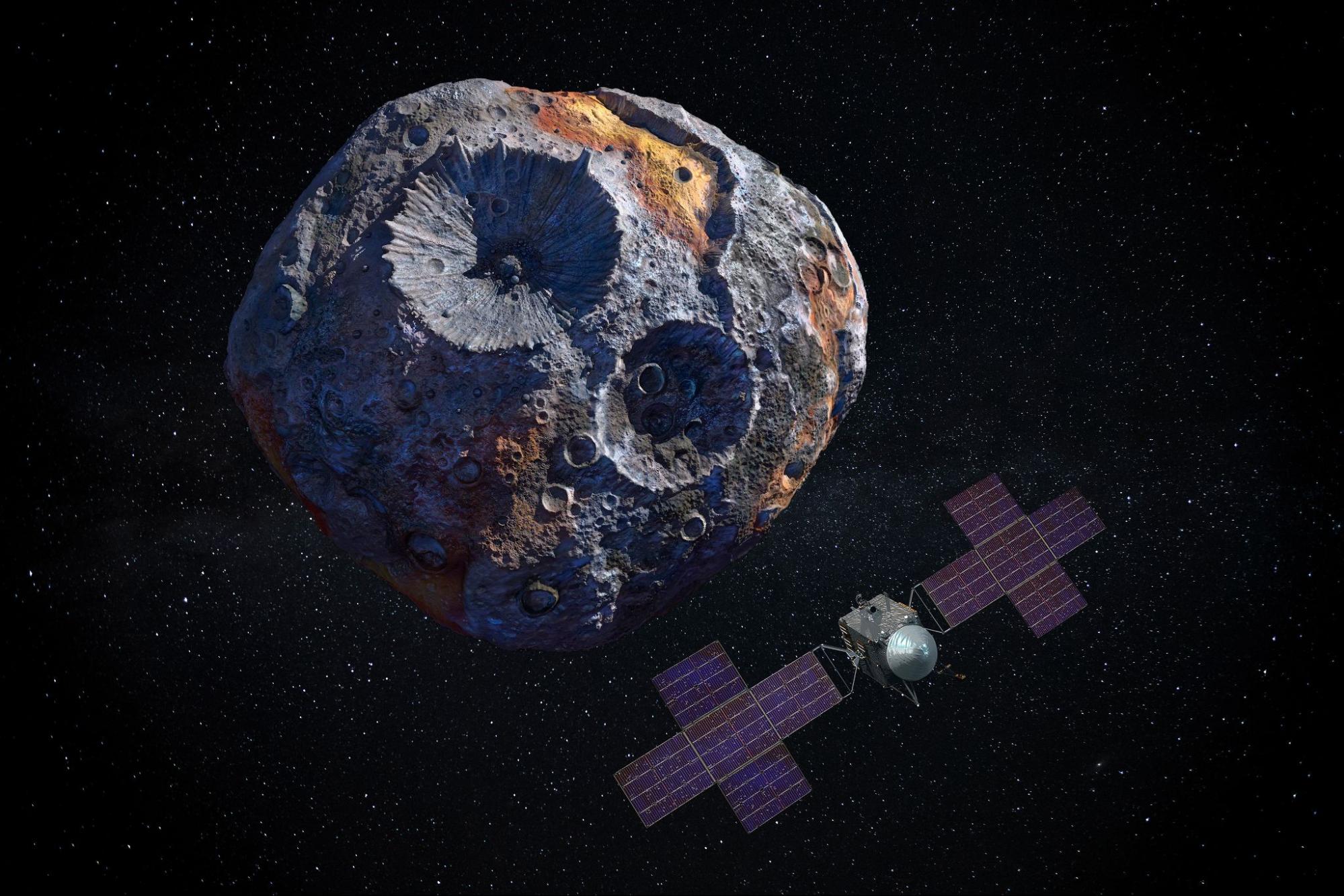 NASA illustration shows a spacecraft with solar panels near a cratered, multicolored asteroid, in starry space.